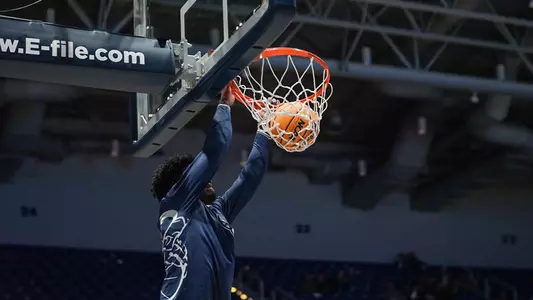 Jah Nze going up for a dunk