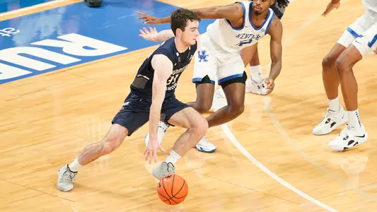Oscar Berry driving to the hoop