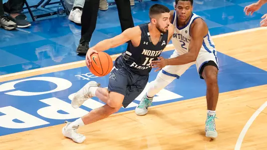 Jose Placer driving to the hoop