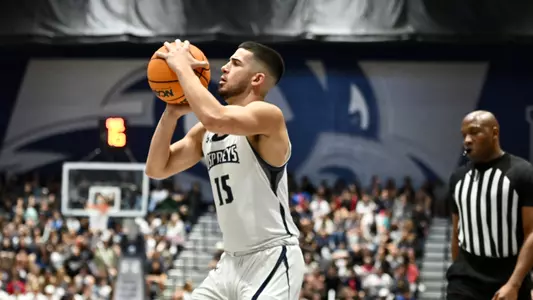 Jose Placer shooting a jump shot