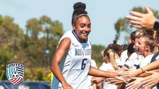 Allyna Thurston high fiving teams