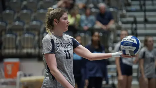 Savannah Cook getting ready to serve the ball