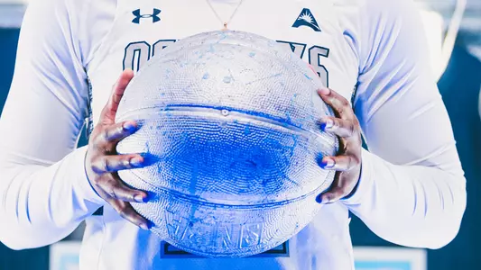 Kaila Rougier holding a basketball