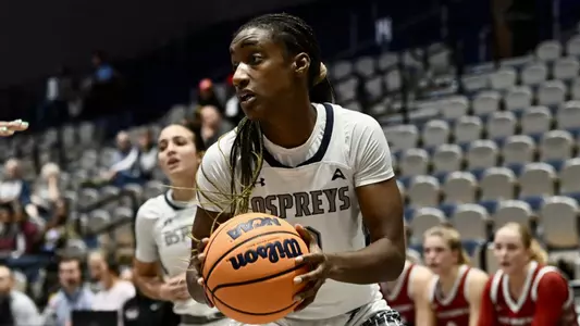 Bri Livingston holds basketball