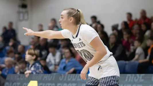 Maddie Millar pointing down court