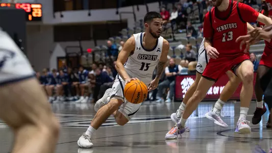 Jose Placer driving to the hoop