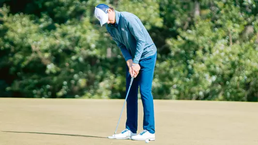 Nick Gabrelcik putts at Sea Best Invite