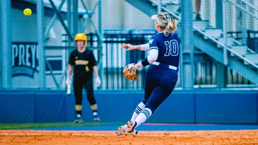 Abi Annett making a throw across the infield