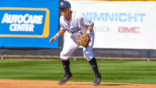 Aidan Sweatt looking on in the fielding position during a game.