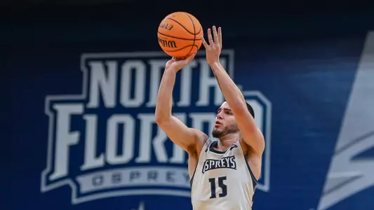 Jose Placer rising up to shoot a jump shot