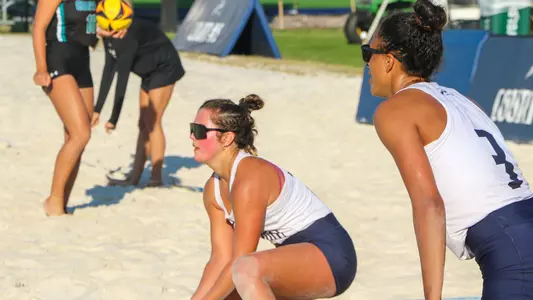Gabby O'Connell and Madeline Camp in the middle of a point