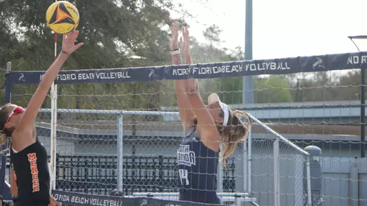 Carleigh Semeniuk going up for a block