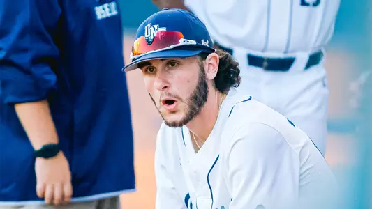 Nico Dimillo in the dugout between innings.