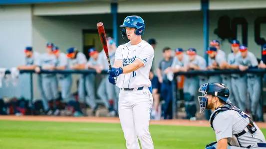 Brock Edge takes a step outside the batters box.