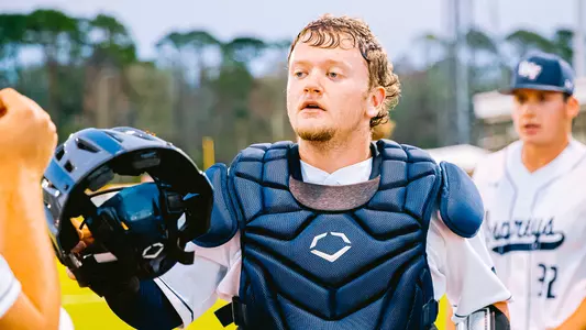 Dallen Leach heading back into the dugout between innings.