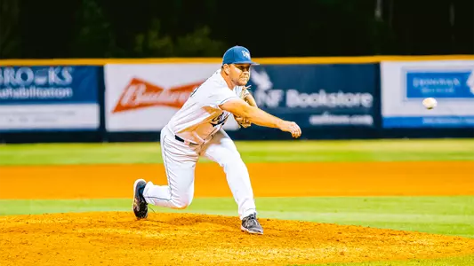 Justin Parrish pitching against UConn.