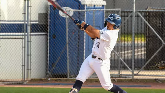 Abraham Sequera swinging at a pitch