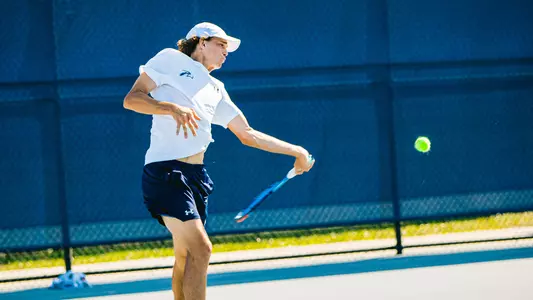 PJ Kotan hitting a forehand.