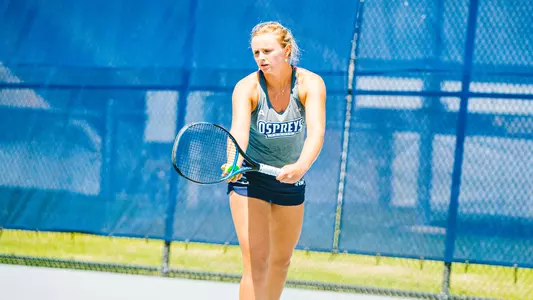 Summer Yardley about to serve.