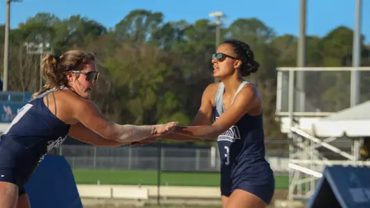 Madeline Camp and Gabby O'Connell high five