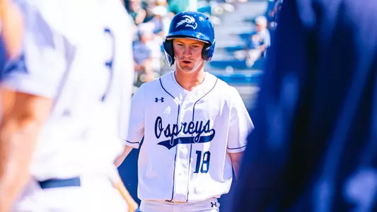 Brock Edge walking back to the dugout
