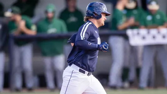 Dallen Leach rounding third base