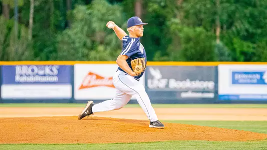 Zach Chappell earned the win in relief as he throws a pitch.