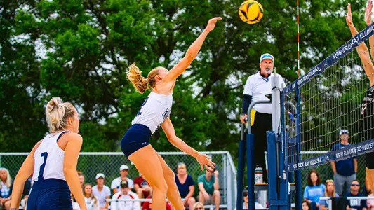 Taryn Griffey hitting an attack on the ball