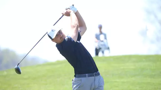 Davis Lee hitting at UVA meet