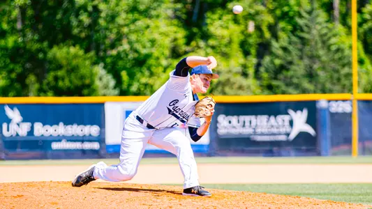 Clayton Boroski following through on a pitch