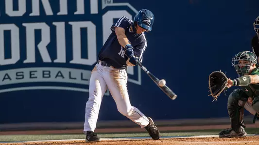 Brock Edge swinging at a pitch