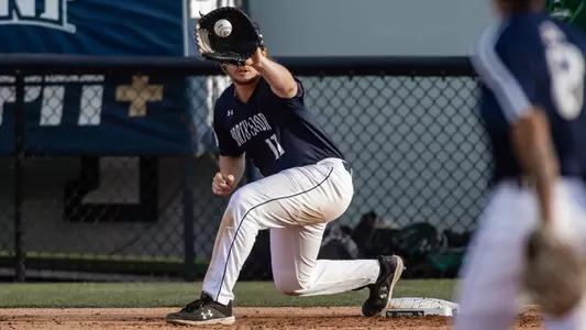 Grant Grodi catching a ball at first