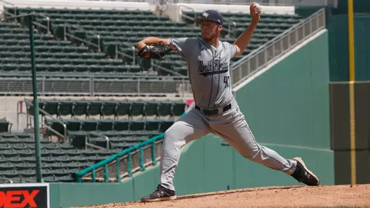 Peter Holden rearing back to make a pitch