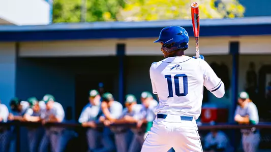 Justin Holmes standing in at the plate