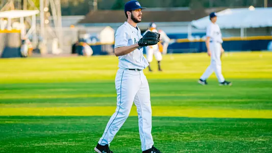 Ryan Jean warming up in the outfield
