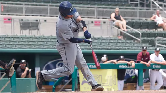 Dallen Leach swinging at a pitch