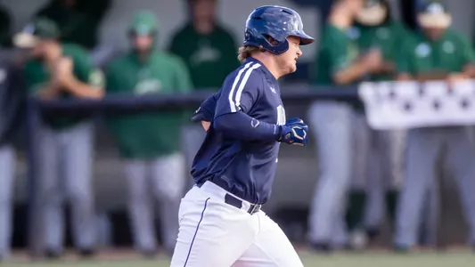 Dallen Leach rounding second base after a home run