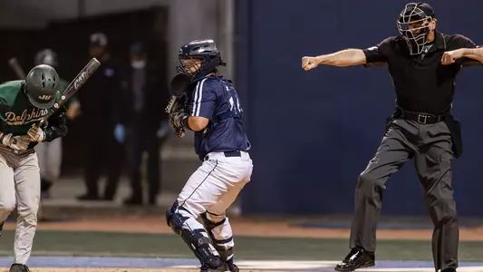 Dallen Leach throwing the ball down to third base