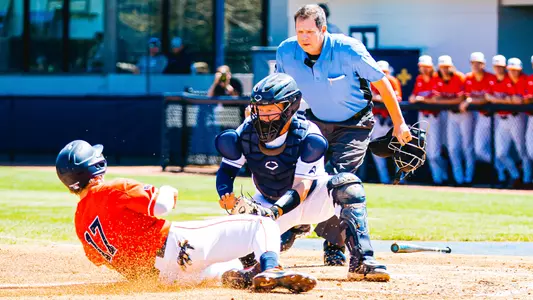 Dallen Leach making a tag on a throw at home