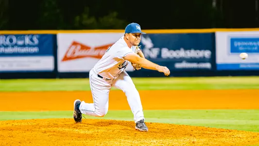 Justin Parrish throwing a pitch