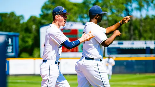 Austin Rusomaroff and Trey Spratling-Williams clapping