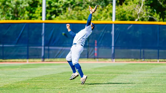 Abraham Sequera making a catch in the outfield