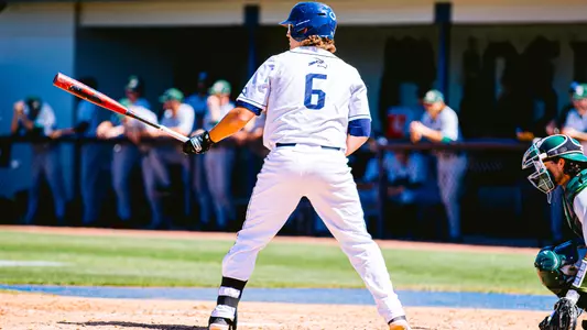 Caleb Stafford standing at the dish