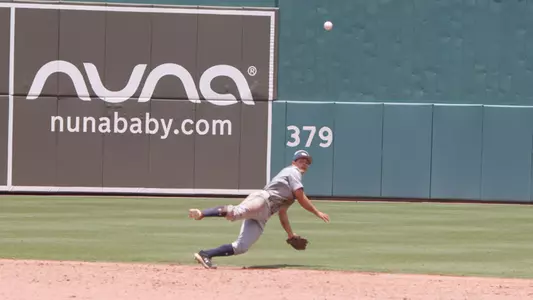 Aidan Sweatt making a throw from second base