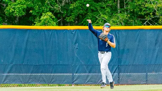 Cade Westbrook throwing the ball in from the outfield