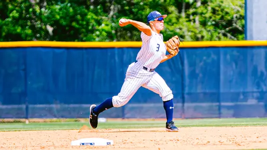 Aidan Sweatt throwing the ball to first base.