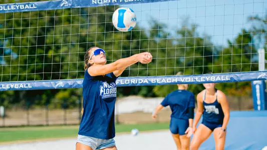 Caleigh Haetten setting the ball