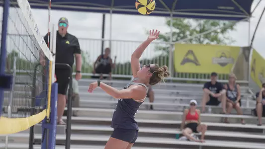 Madeline Camp making an attack on the ball