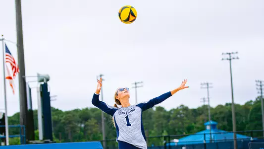 Jordan Cooper serving the ball