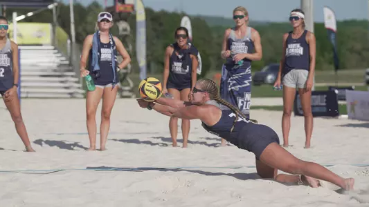 Lauren Galinis diving after the ball